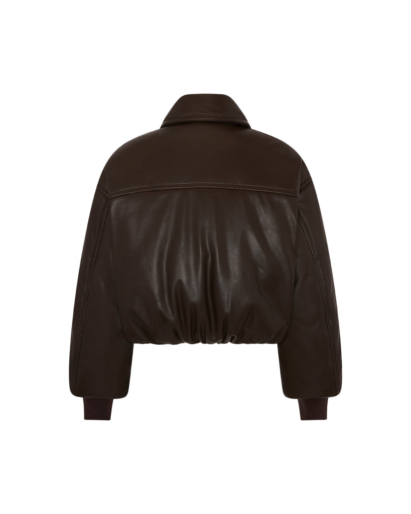 Stay warm and stylish in our chocolate brown, vegan leather Padded Bomber Jacket. Crafted with a super soft feel, gathered hem, and ribbed knit cuffs... it's a must-have. Shop now!
