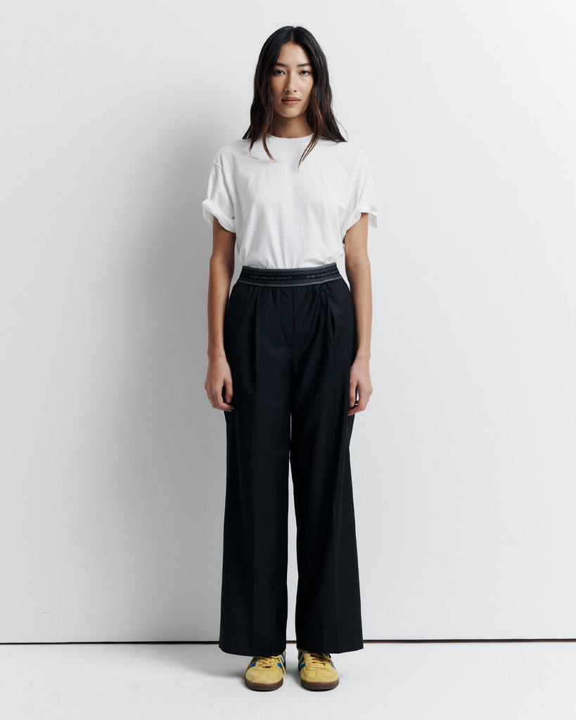The RAS Pant by Romy Athletic Society combines everyday comfort with elevated style. Crafted from a luxurious wool blend, it features a sporty elastic waistband, side pockets, a faux fly, and a single welt back pocket.