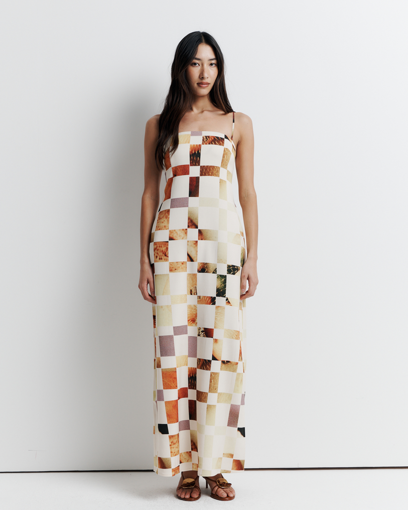 The Rochelle Dress – A sleek column silhouette with a straight neckline, rouleau straps, and internal bustier support. Features exclusive artwork by Phoebe Willis. Shop now!