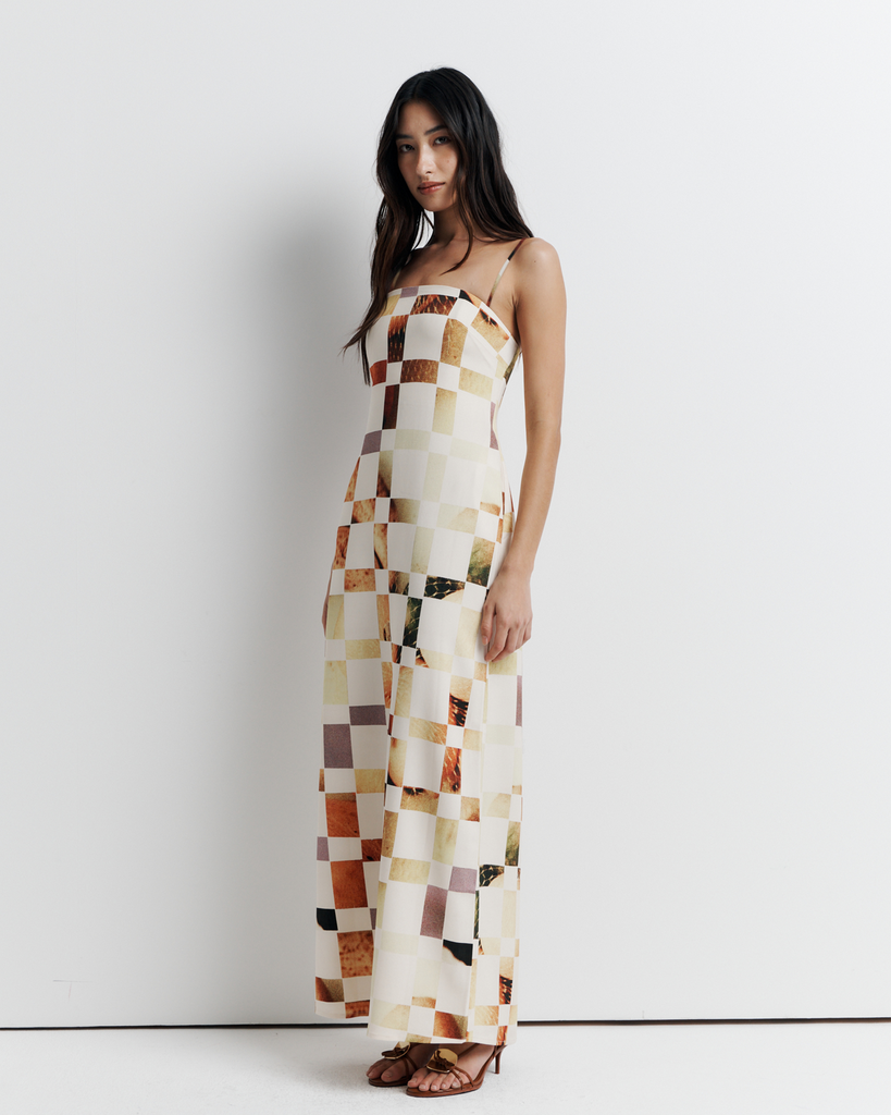 The Rochelle Dress – A sleek column silhouette with a straight neckline, rouleau straps, and internal bustier support. Features exclusive artwork by Phoebe Willis. Shop now!