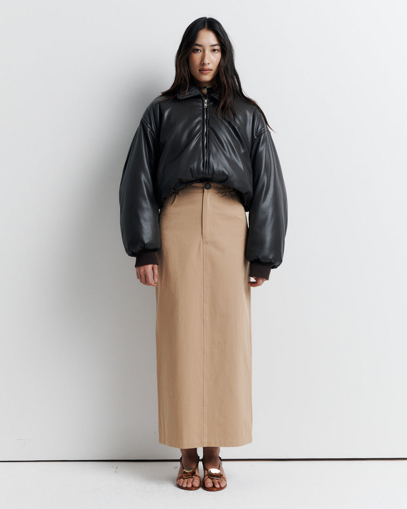 Stay warm and stylish in our chocolate brown, vegan leather Padded Bomber Jacket. Crafted with a super soft feel, gathered hem, and ribbed knit cuffs... it's a must-have. Shop now!