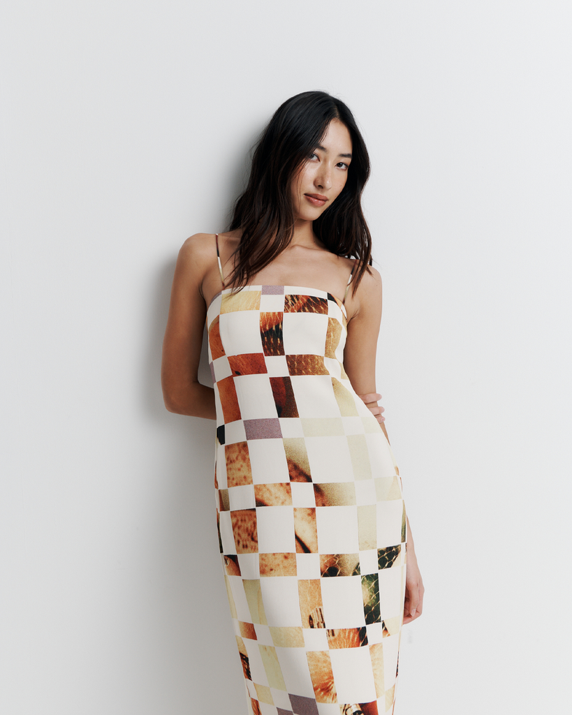 The Rochelle Dress – A sleek column silhouette with a straight neckline, rouleau straps, and internal bustier support. Features exclusive artwork by Phoebe Willis. Shop now!