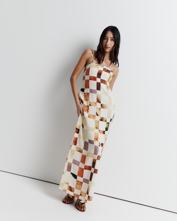 The Rochelle Dress – A sleek column silhouette with a straight neckline, rouleau straps, and internal bustier support. Features exclusive artwork by Phoebe Willis. Shop now!