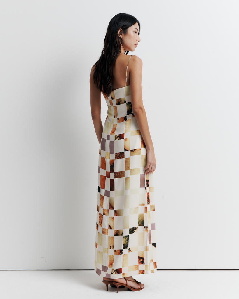 The Rochelle Dress – A sleek column silhouette with a straight neckline, rouleau straps, and internal bustier support. Features exclusive artwork by Phoebe Willis. Shop now!