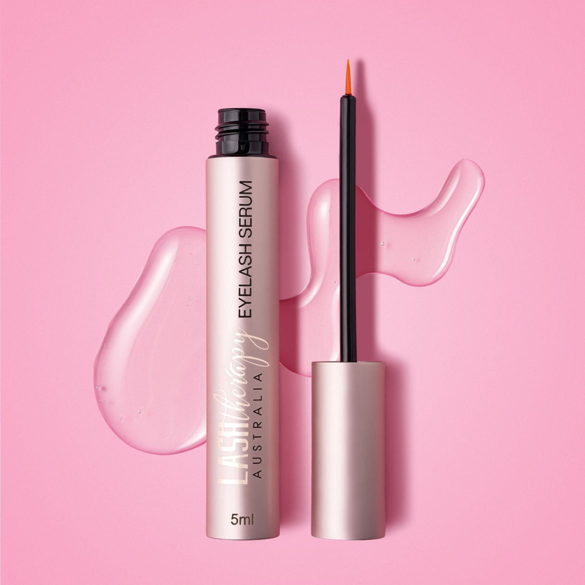 Lash Therapy Australia Jumbo Eyelash Growth Serum 5ml with precision applicator on pink background